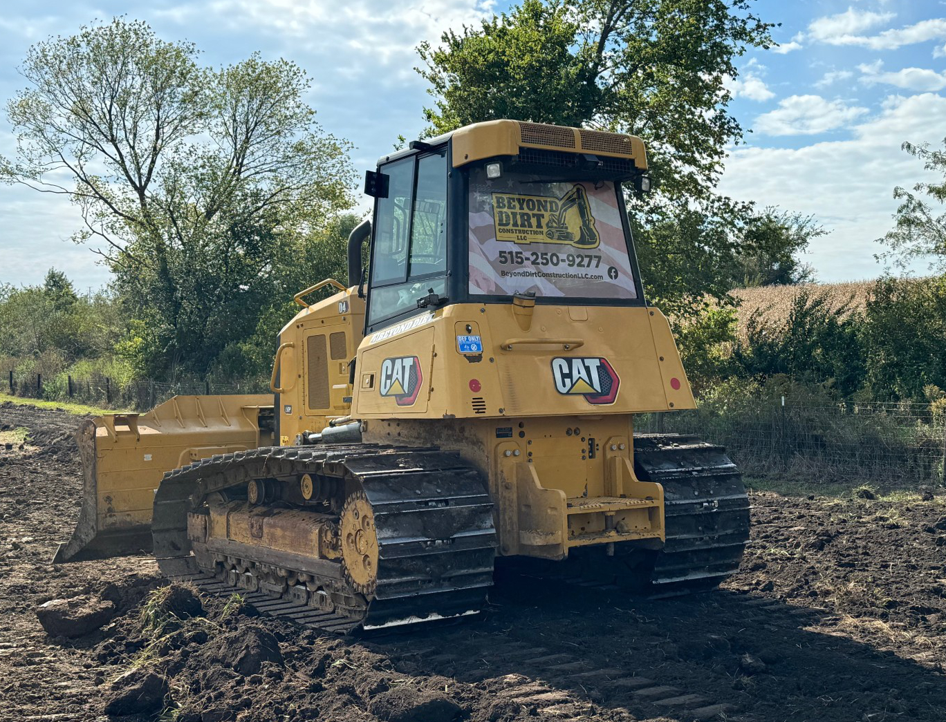 Caterpillar D4 doing site preparation work
