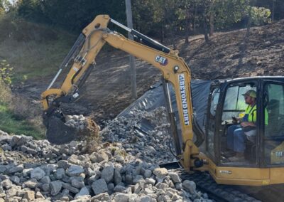 CAT excavator working on erosion control project