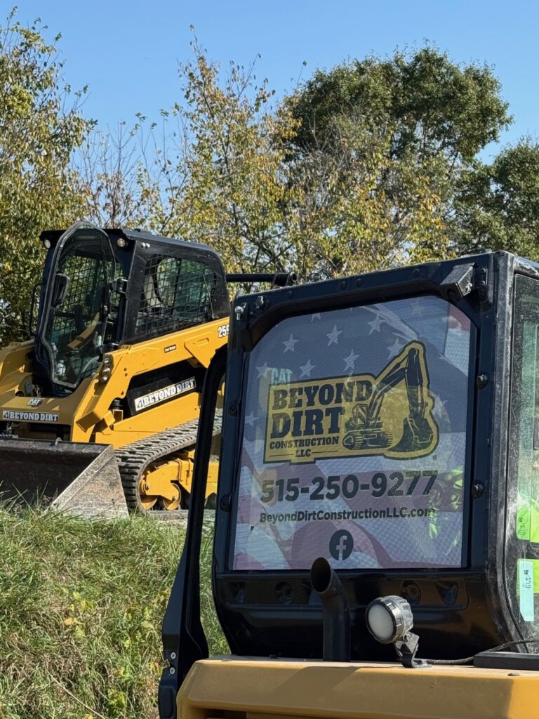 CAT skid steers at work on land clearing project