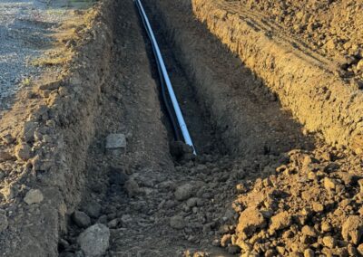 Water Line Trenching project excavation and exposed pipes